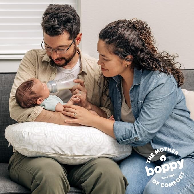 Boppy Nursing Pillow - Firm, Ergonomic U-Shaped Bottle and Breastfeeding Pillow with High Lift for Comfort and Support, Spacious Surface - Cream Retro Squiggles