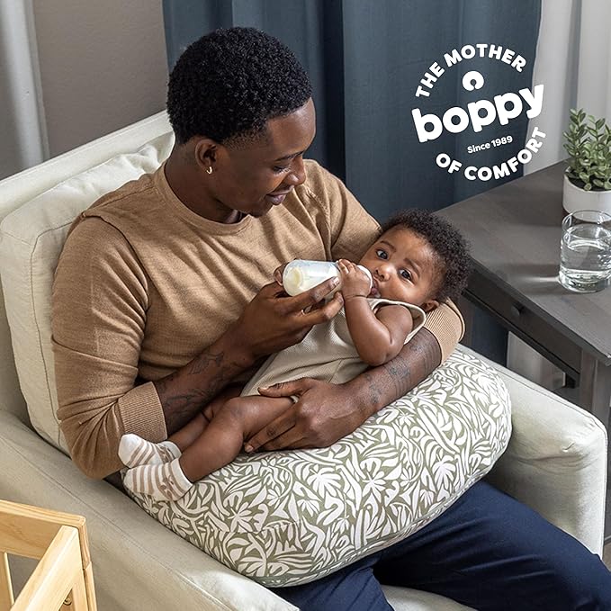 Boppy Nursing Pillow - Ergonomic Bottle & Breastfeeding Pillow, Higher, Firmer & Larger, Water-Repellent with Washable Organic Cotton Cover, Baby Safety Alliance Verified - Green Cut Out Leaves