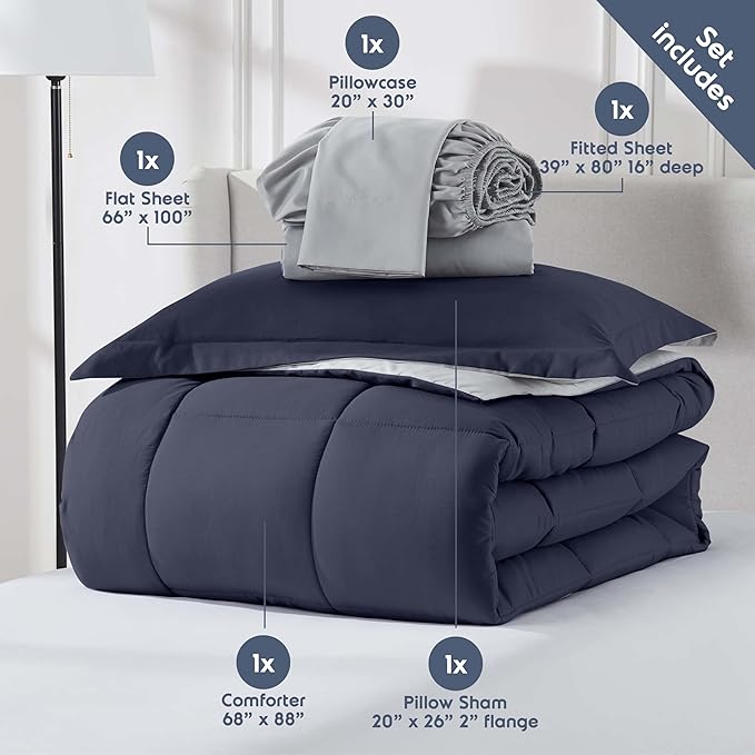 Nestl 7 Piece Twin XL Comforter Set – Navy Reversible Bed in a Bag – Complete Twin XL Size Bedding Set with Sheets, Set of 2 Down Alternative Pillows, Pillowcase and Sham